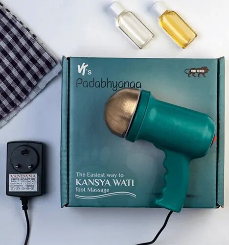 VT's Padabhyanga Kansya Wati massager on its box, with the adaptor and two bottles of massage oil. The box reads: The easiest way to Kansya Wati foot massage